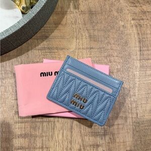 Miu Miu Light Blue Leather Cardholder
 Includes:
Box 
Dusty bag